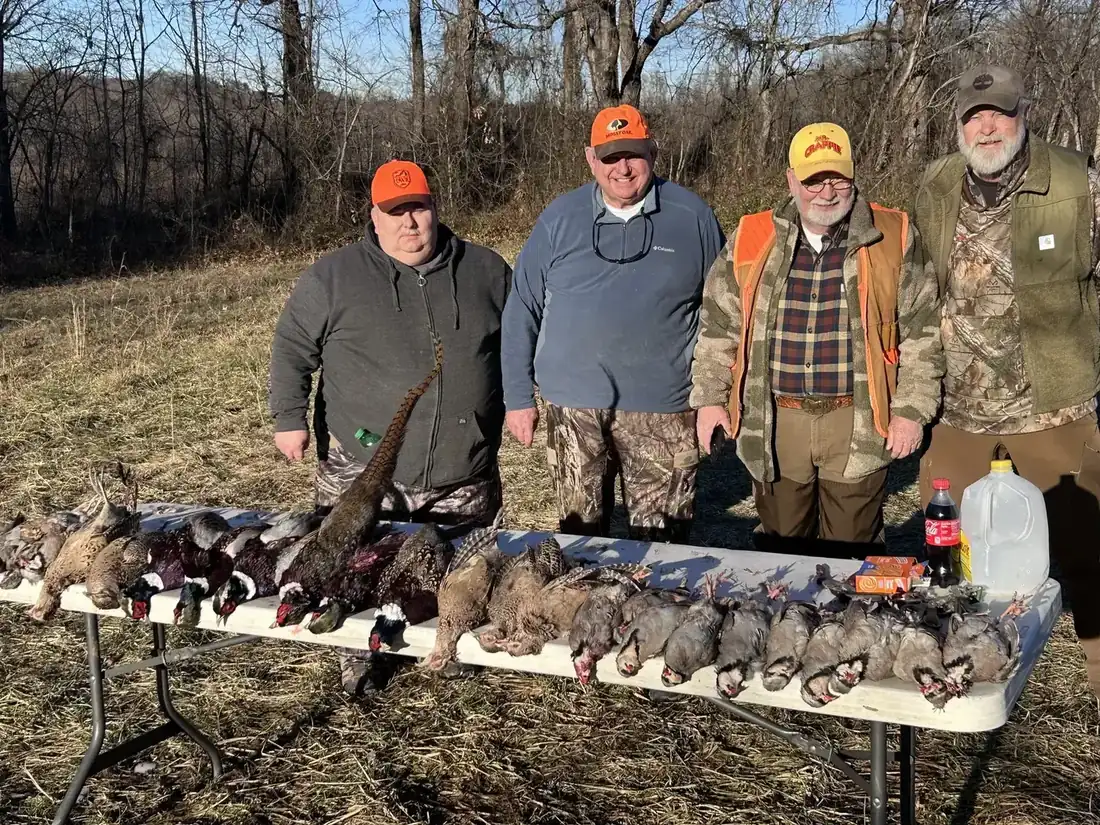 Four hunters and their birds