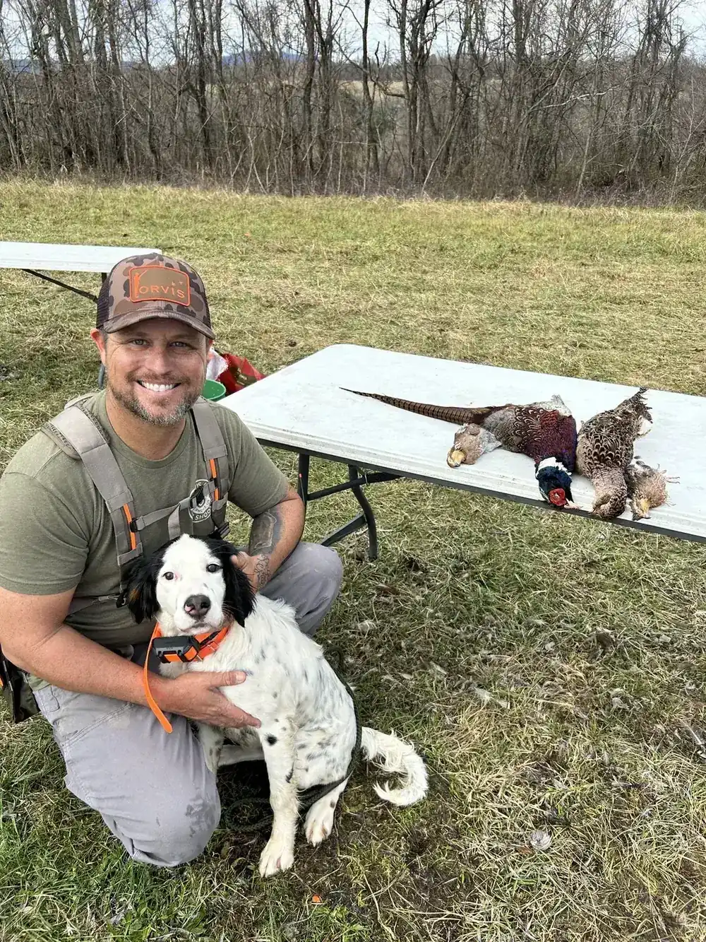 Guide and gun dog with the day's birds