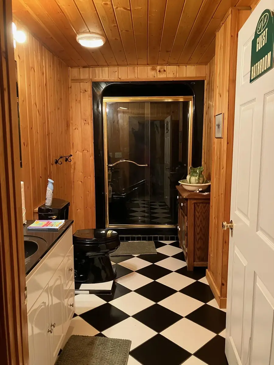 The hallway and guest bath inside the lodge