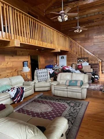 The living area with leather seating inside the lodge